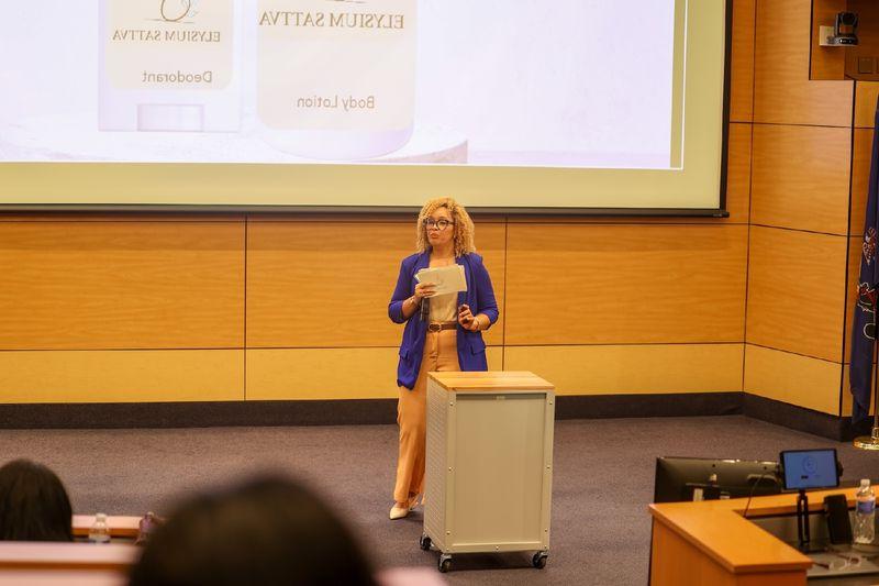 woman speaking at podium