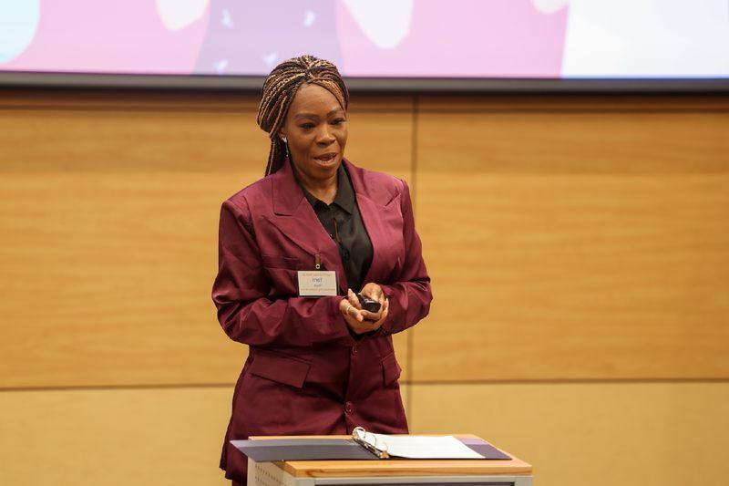 woman speaking at podium